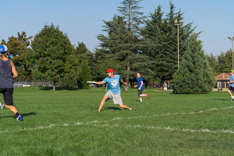 A player laying out for a disc at SOUPA pickup