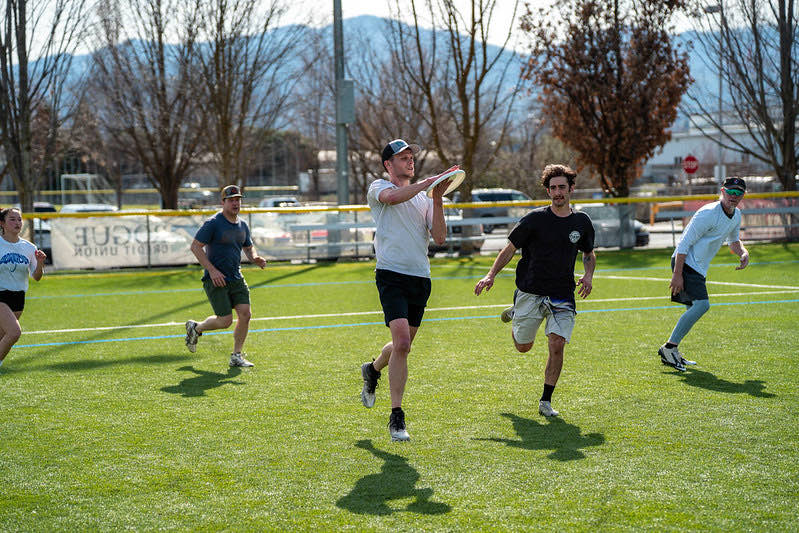SOUPA winter league players chasing a throw